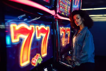 A cheerful woman in traditional clothing using her smartphone during a festive moment, showing how easily the GK222 app fits into everyday life.