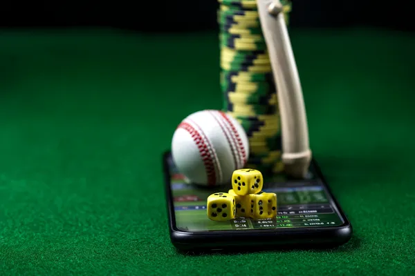 A glowing roulette wheel with cascading chips, symbolizing the engaging live and instant-win games available on GK222.